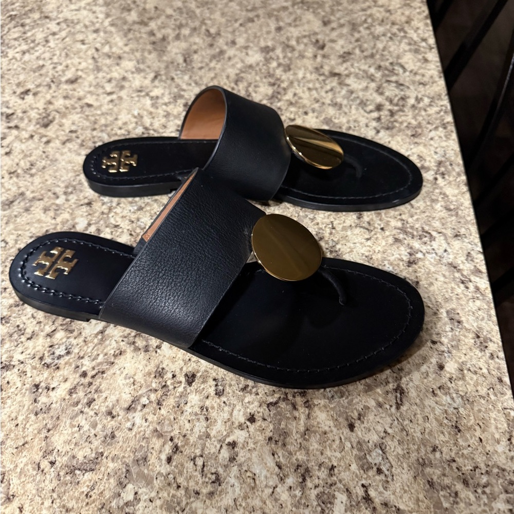 Tory Burch Black and Gold Sandals with Minimalist Design. Never worn.